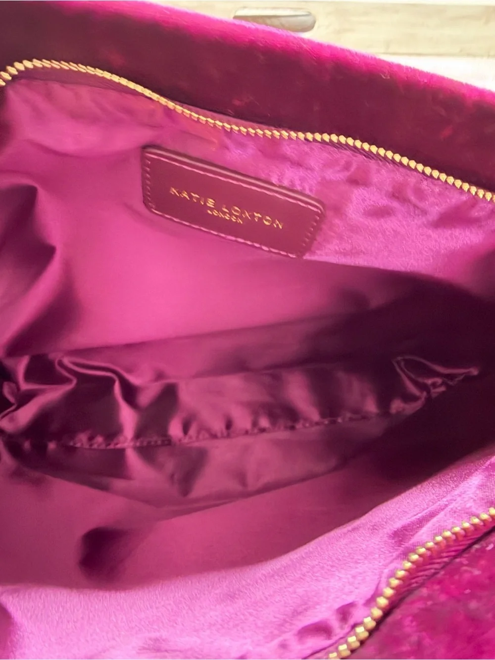 Katie Loxton magenta crushed velvet pouch bag